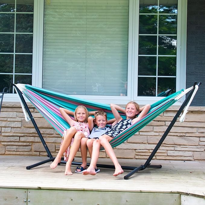 Vivere Double Cotton Hammock with Space Saving Steel Stand, Upgraded Polyester End Strings 450 lb Capacity - Premium Carry Bag Included - USA Grown Cotton (Watermelon)