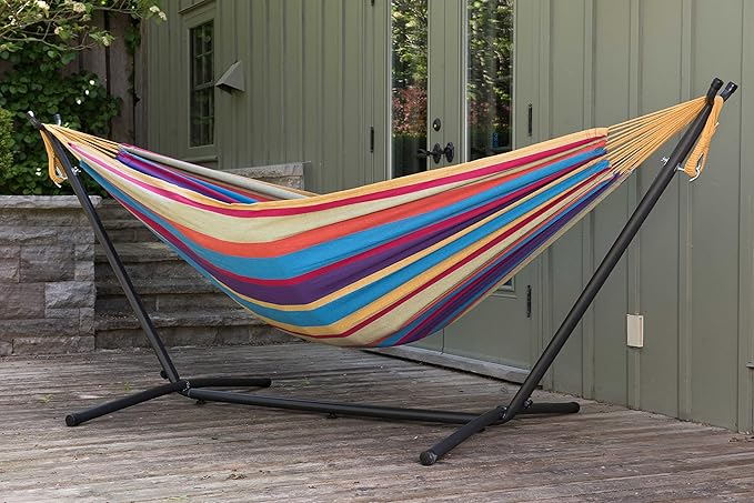 Vivere Double Cotton Hammock with Space Saving Steel Stand, Upgraded Polyester End Strings 450 lb Capacity - Premium Carry Bag Included - (Tropical)